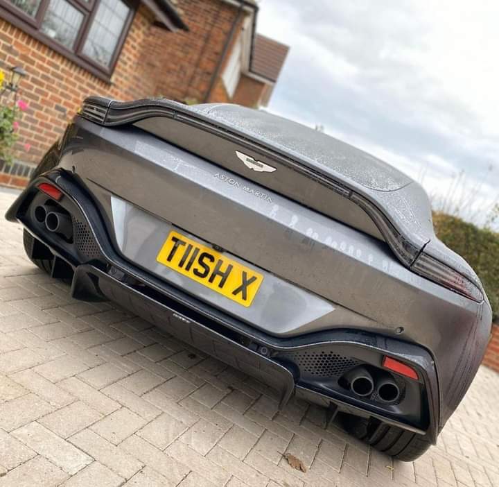 aston martin with a custom made eclipse car number plate