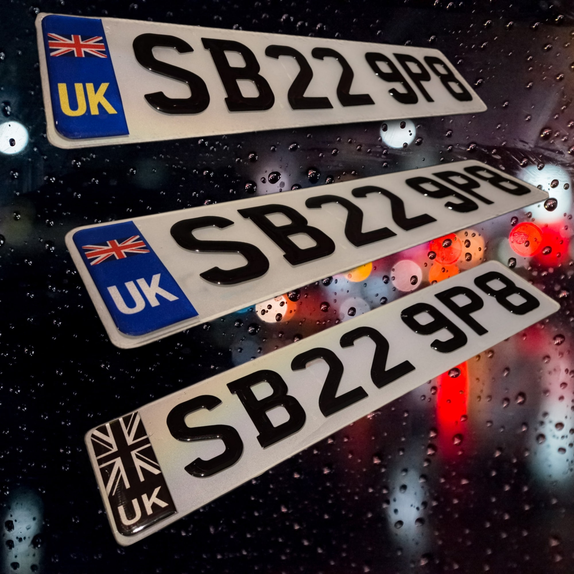 Close-up of a vehicles license plate number.